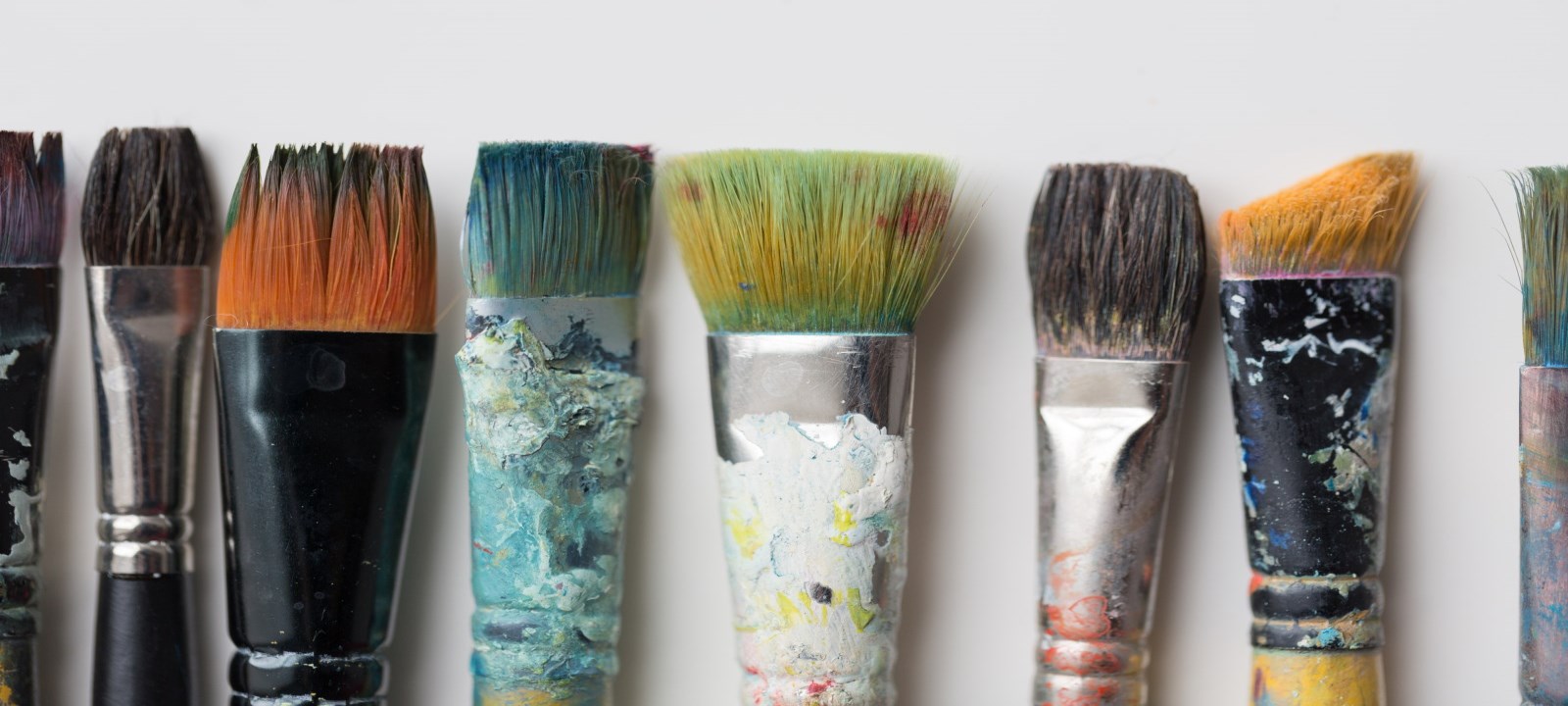 Paint brushes with paint stains